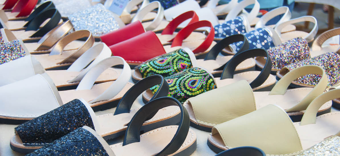 Typical Spanish shoes selling at a market along a street