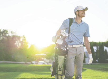 Young man playing golf outdoors