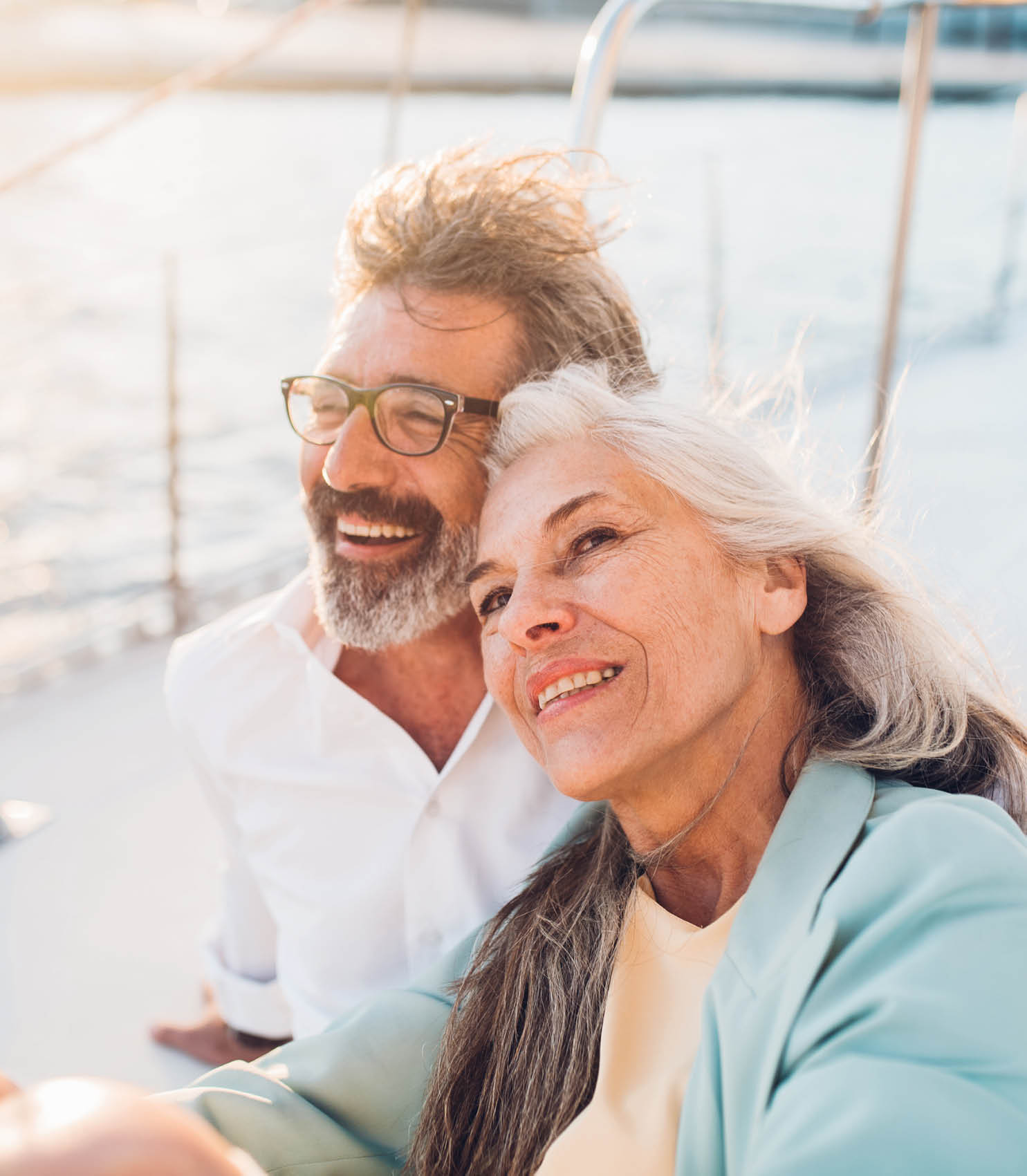 Senior couple in love sailing together