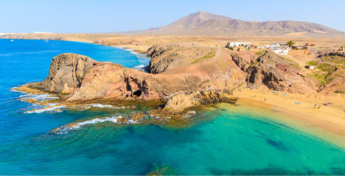 Turquoise ocean water on Papagayo beach, Lanzarote, Canary Islands, Spain