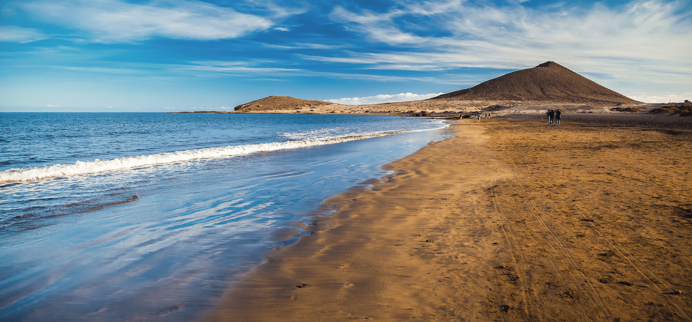 view of Playa el Medano beach with Montana Roja mountain on the background, Tenerife, Canary islands, Spain