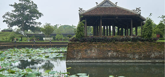 Traditional vietnamese tempel wall with colorful paintings in Hue citadel, Vietnam