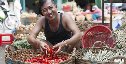 Asian Man on Street Market Smile Sell Red Chilly Pepper