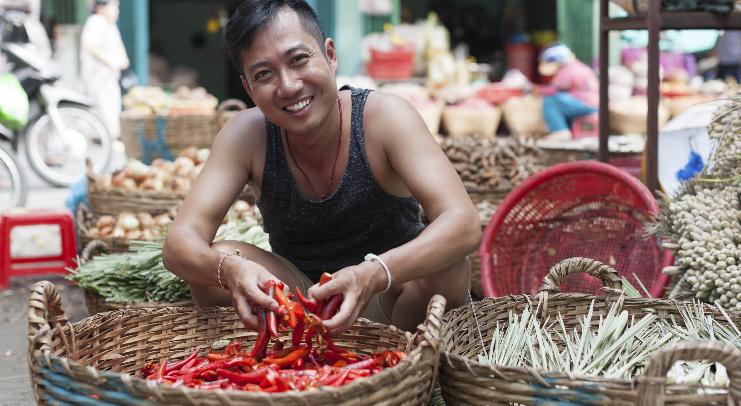 Asian Man on Street Market Smile Sell Red Chilly Pepper