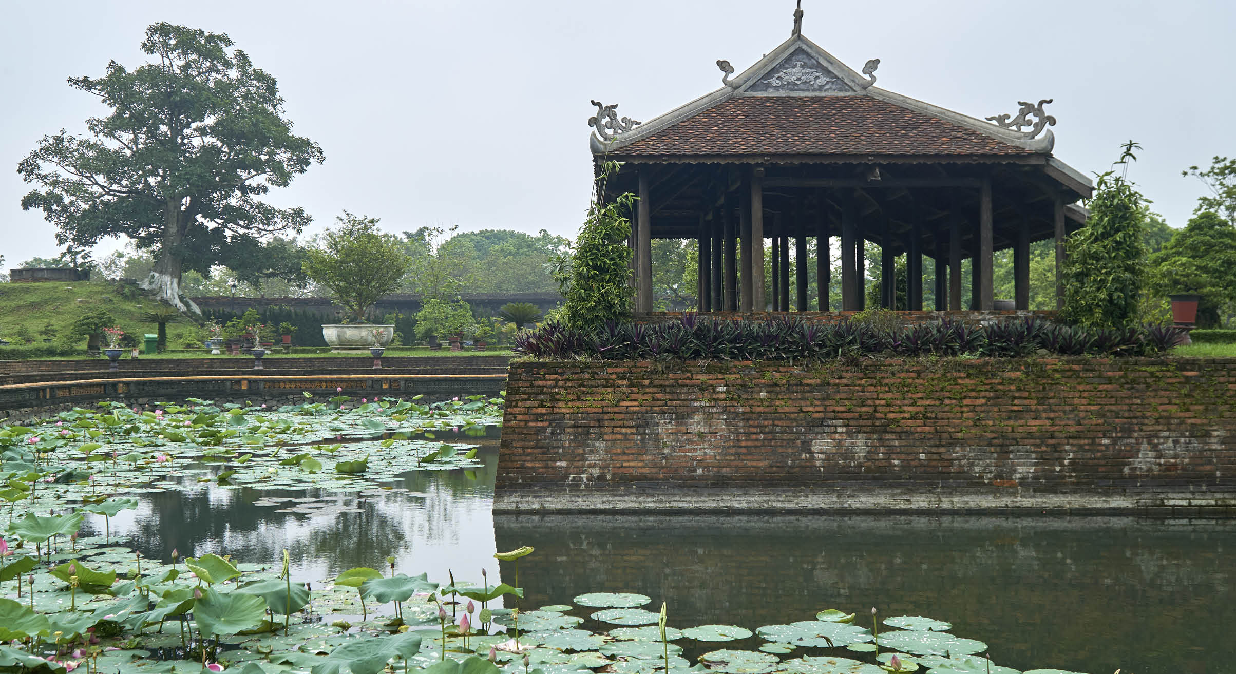Traditional vietnamese tempel wall with colorful paintings in Hue citadel, Vietnam