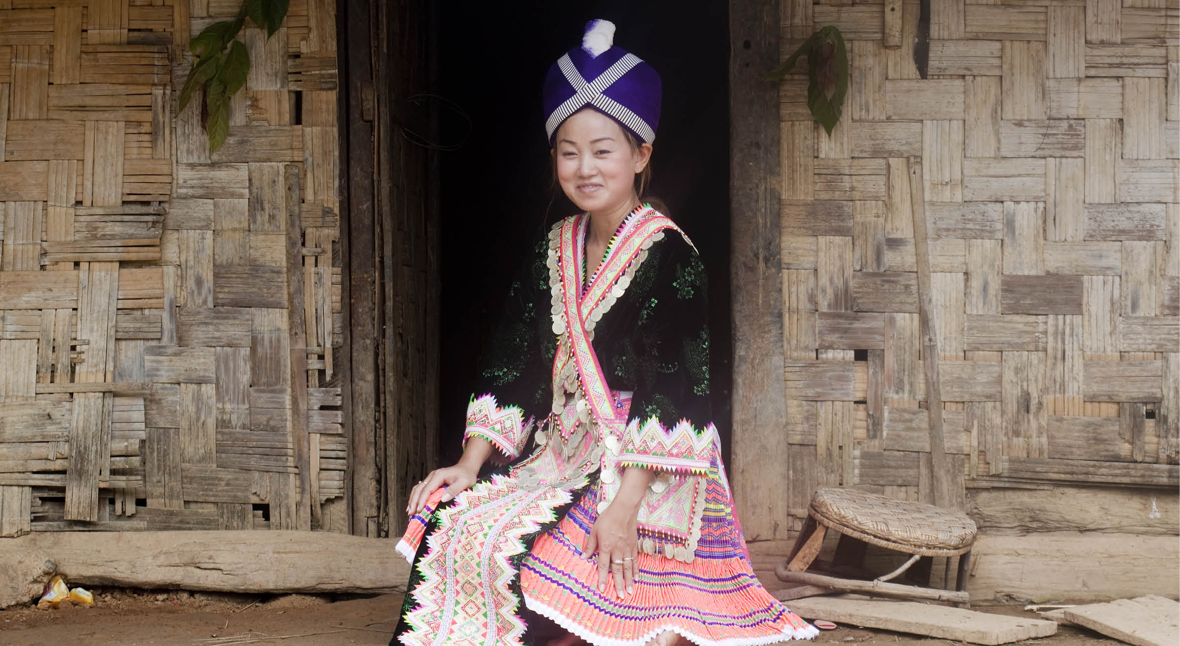 Asian woman Laos in traditional clothes, Hmong, in a Hmong village near Vang Vieng