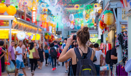 2019 March 1st, Singapore, Chinatown - People walking and shopping on the street market after sunset.