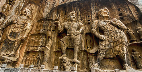 LUOYANG, CHINA - OCTOBER 28: Visitors at Longmen grottoes on October 28, 2007.It is one of the four notable grottoes in Luoyang,Henan,China . A UNESCO World Heritage Site.