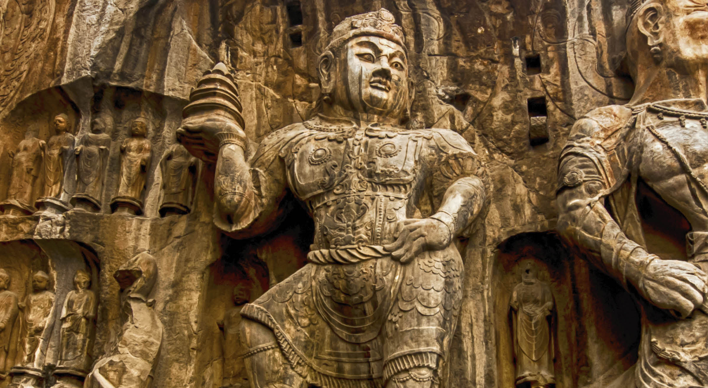 LUOYANG, CHINA - OCTOBER 28: Visitors at Longmen grottoes on October 28, 2007.It is one of the four notable grottoes in Luoyang,Henan,China . A UNESCO World Heritage Site.