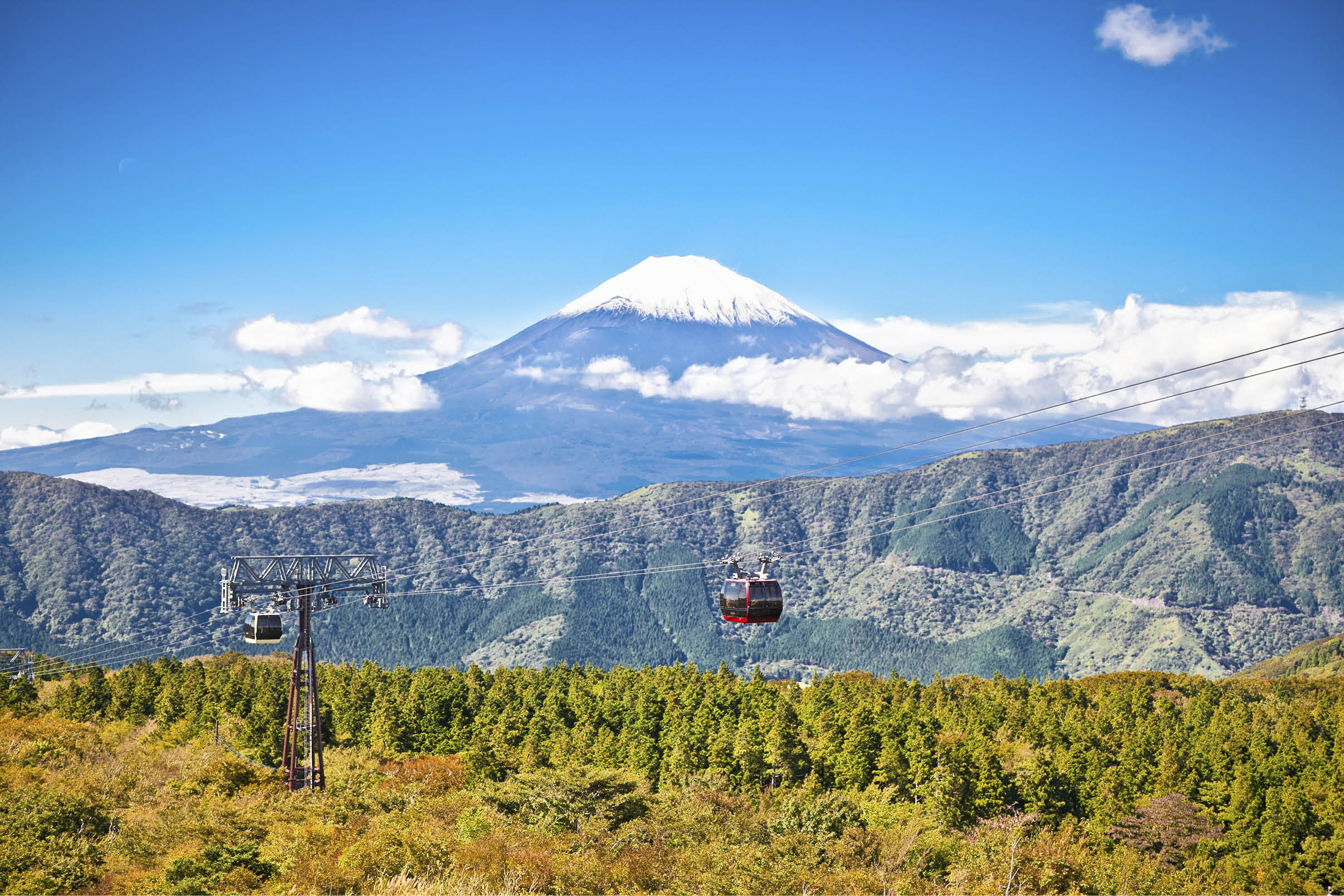 Ropeway and view of Mountain Fuji from Owakudani, Hakone. Japan.