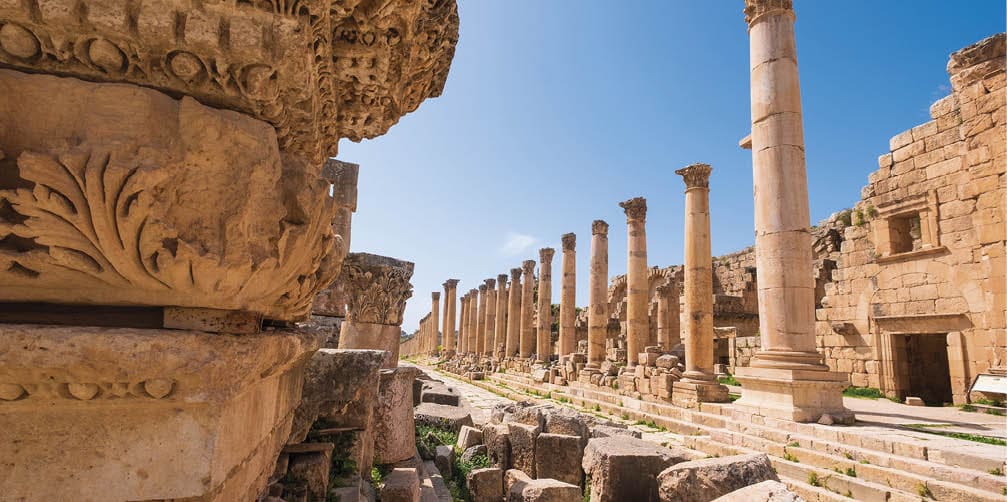 a stone ornament of column base on the ruins of the city of Jerash in Jordan in spring