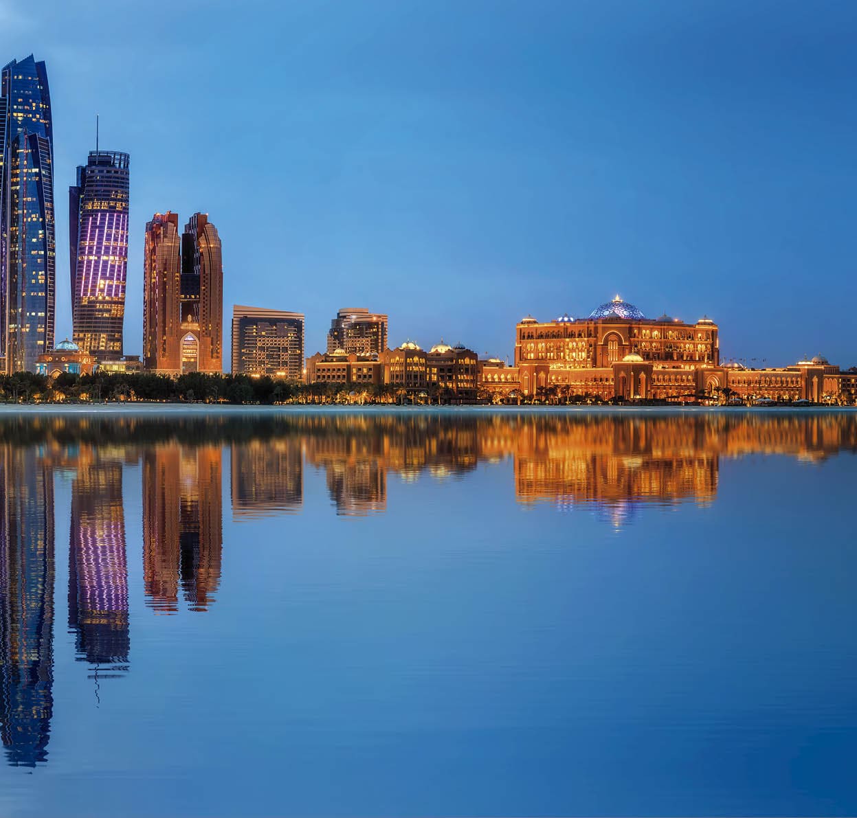 View of Abu Dhabi Skyline at sunset, United Arab Emirates