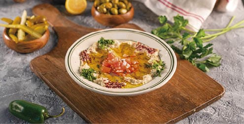 Mutabal has only roasted eggplant, tahini, olive oil, parsley and garlic