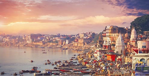 Holy town Varanasi and bank of the Ganges river with ghats