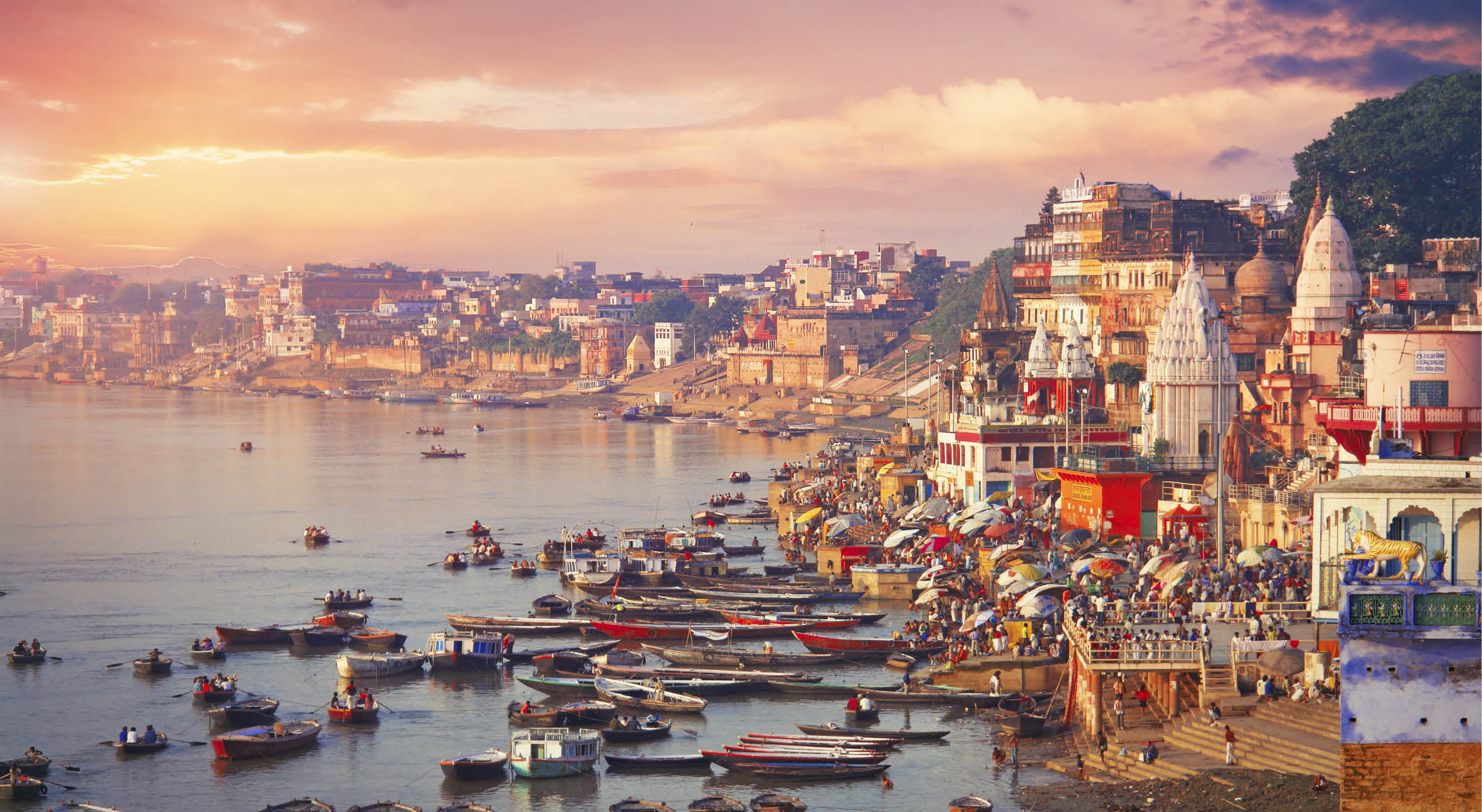 Holy town Varanasi and bank of the Ganges river with ghats